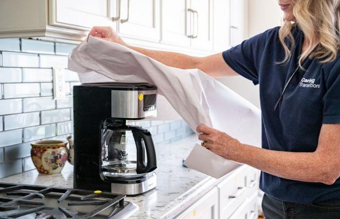 Caring Transitions team assisting clients with downsizing and relocation